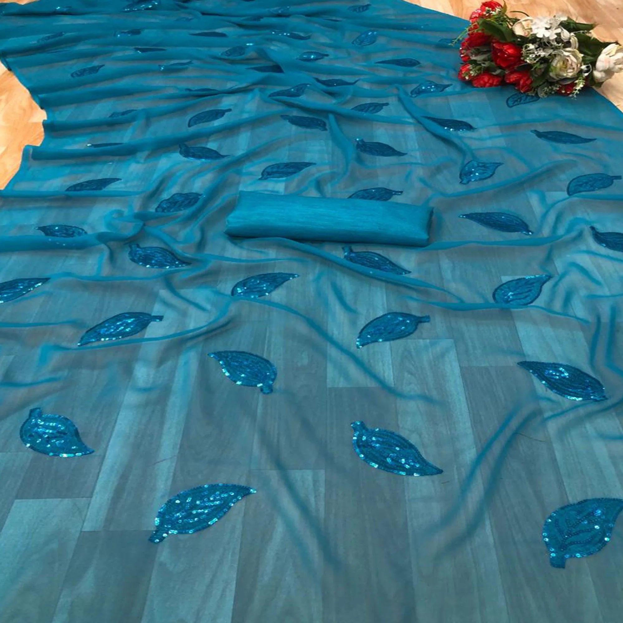 Blue Partywear Leaf Sequins Georgette Saree